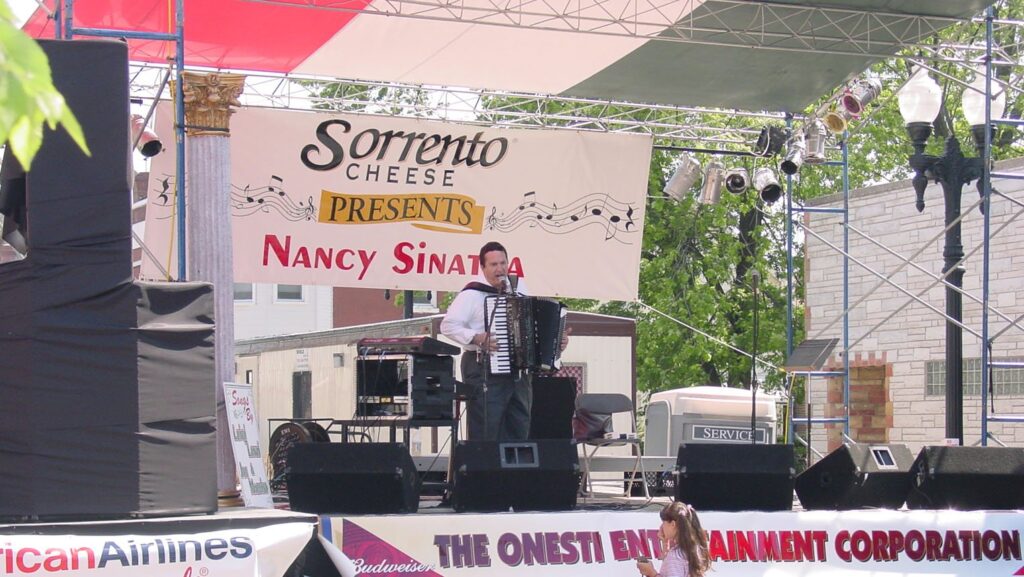 Joe Martino on a festival main stage presented by Onesti Entertainment